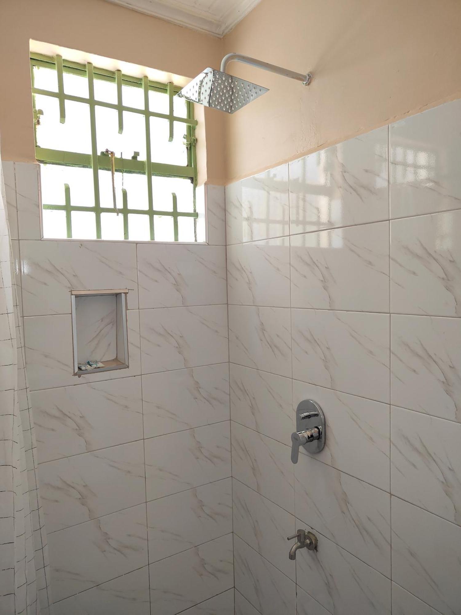 Milimani Drive Livings Apartment Кисуму Стая снимка